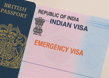 British passport next to an Indian emergency visa page marked with the words "Emergency Visa"