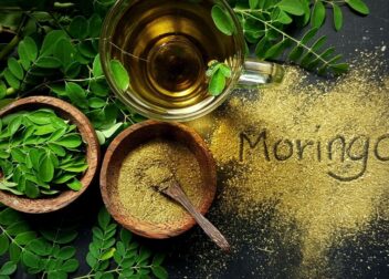 Fresh Moringa leaves, a nutrient-rich superfood known as the Miracle Tree, supporting immunity and overall health.