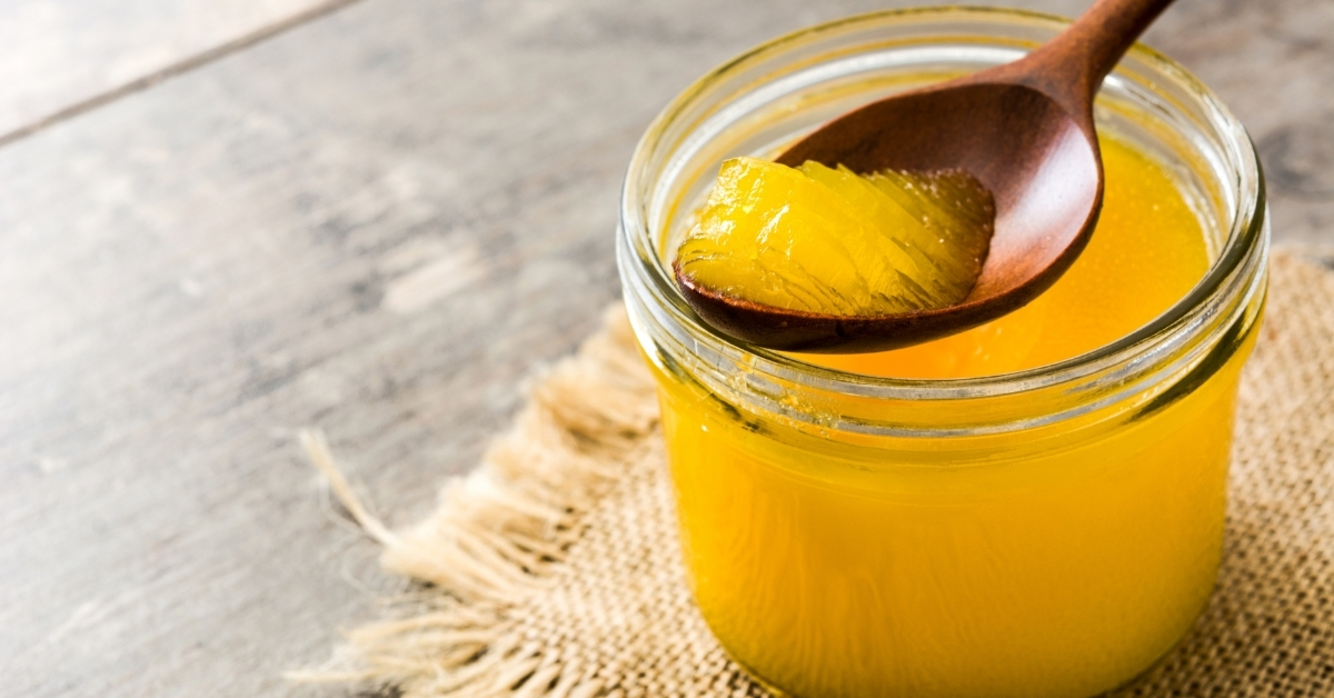 Ayurvedic benefits of drinking ghee in warm water on an empty stomach for digestion and vitality.